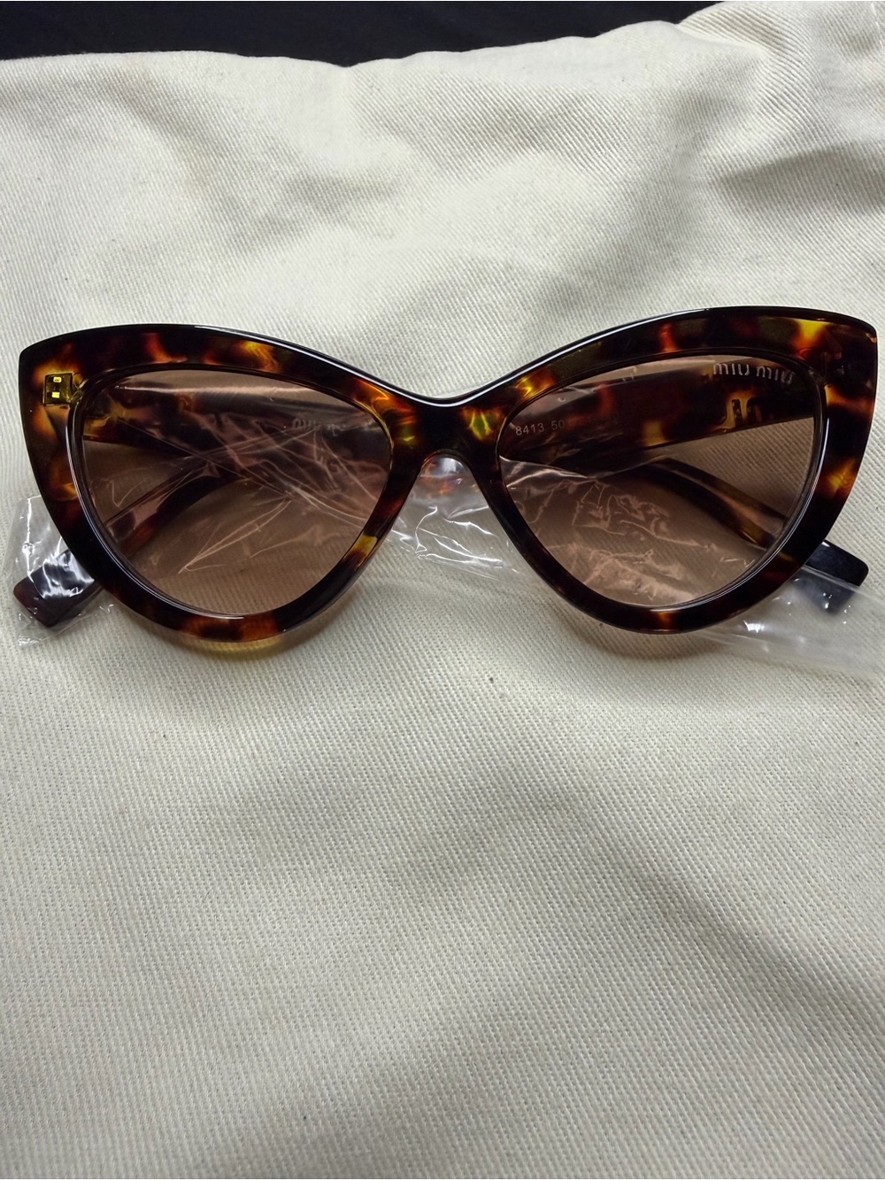 Miu Miu Tortoiseshell Cat Eye Sunglasses with Brown Lenses